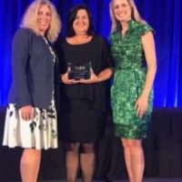 Kathy Segmuller being honored as Franchisee of the year 2018